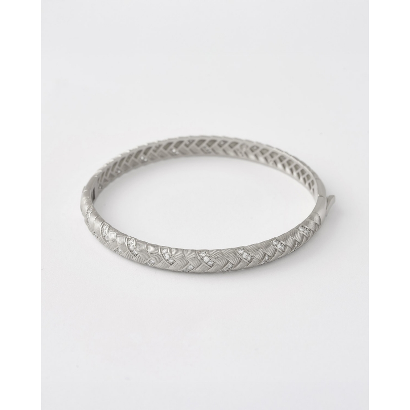 PULSERA TRENZADADA EN ESPIGA Y...